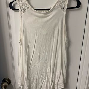 nice white tank top with flowers on shoulders